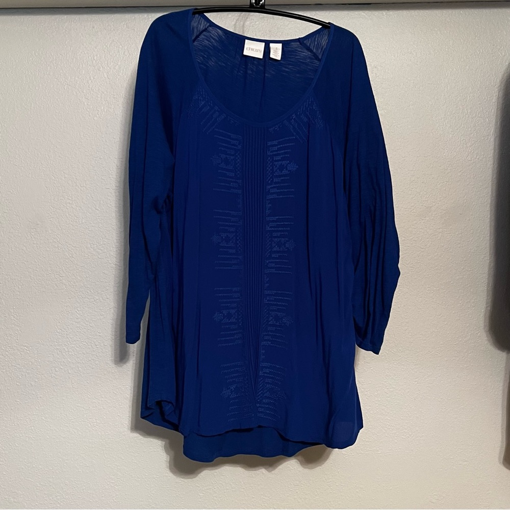 Chicos Scoop Neck With Roll Tab Raglan Sleeve and Pin-tucks Embroidery Blouse.